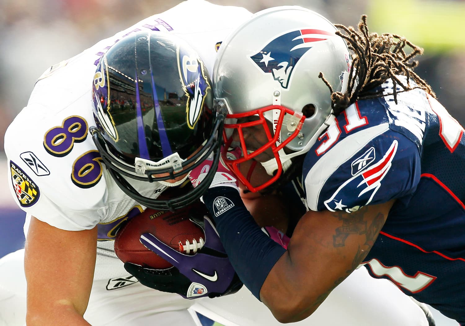 Two boys playing american football